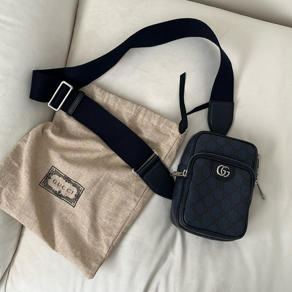Authentic Gucci mini body bag with sling